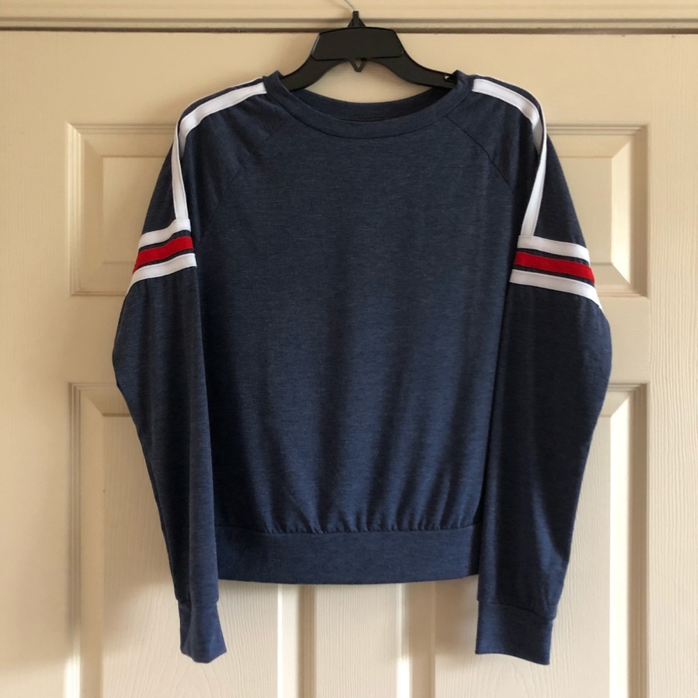 Blue top with shoulder stripes.